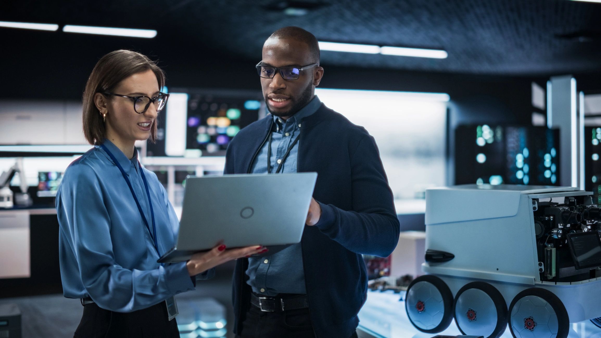 Professionals collaborating in a high-tech laboratory